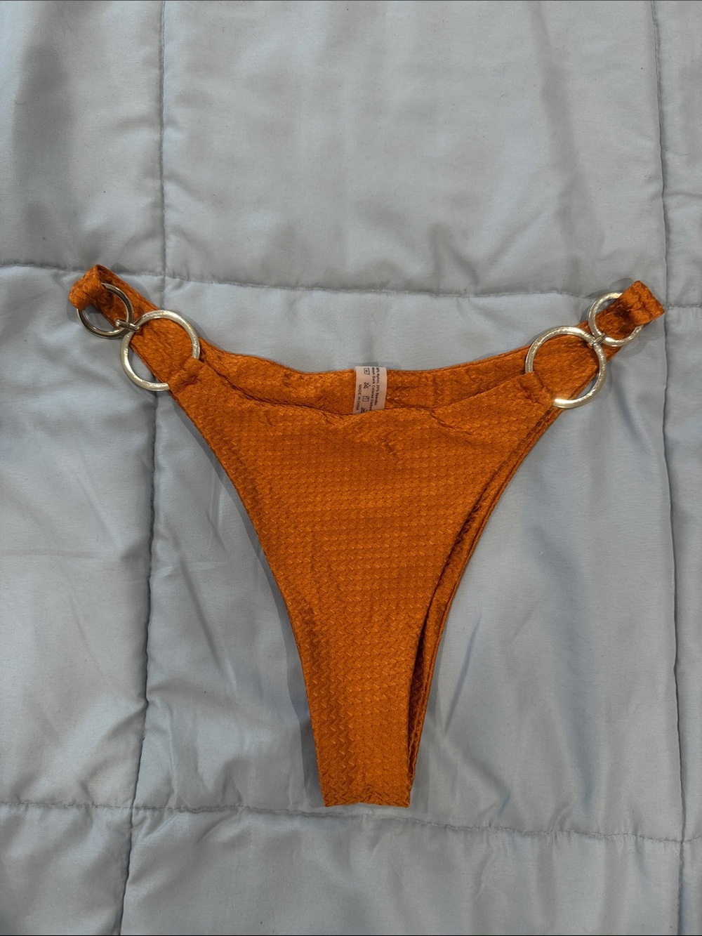 SHEIN medium orange textured bikini bottom with gold detail